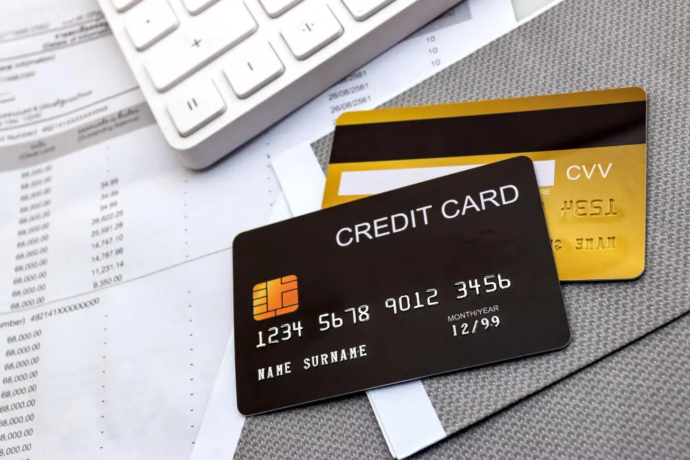 Credit card placed on business documents, symbolizing finance, payments, and secure transactions